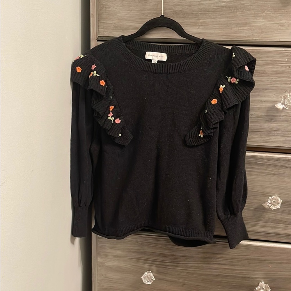 Black Sweater with Floral Ruffle Detail